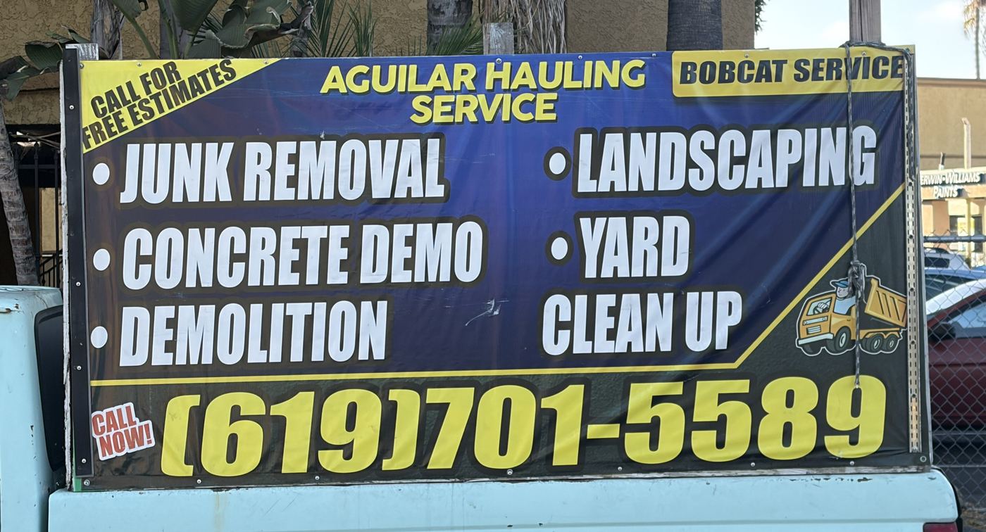 Aguilar Hauling Service truck banner